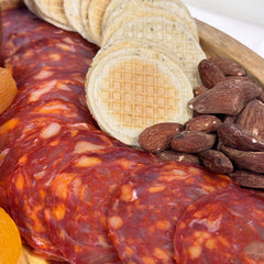 Angel’s Salumi and Truffles – Spanish Cantimpalo Salami Slices Served with Manchego, Figs, and Marcona Almonds