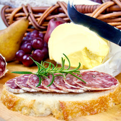 Angel’s Salumi and Truffles – Sliced Rosette de Lyon on Charcuterie Board, Aged Salami with White Wine, Clove, Nutmeg, and Garlic