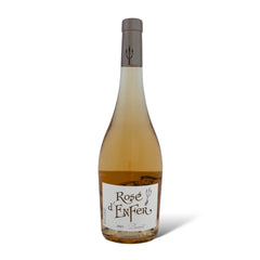 Bottle of Rosé d’Enfer French rosé wine — pale pink hue with bluish reflections, made from Tannat, Cabernet Sauvignon, and Merlot; elegant, fruity, and refreshing with notes of red berries, peach, and citrus