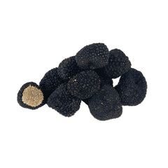 Black Summer Truffle (50g), foraged from European forests, offering subtle earthy flavor and aroma; stored in a cool, dry place to maintain freshness. Sold as whole pieces, typically weighing 1oz-1.5oz.
